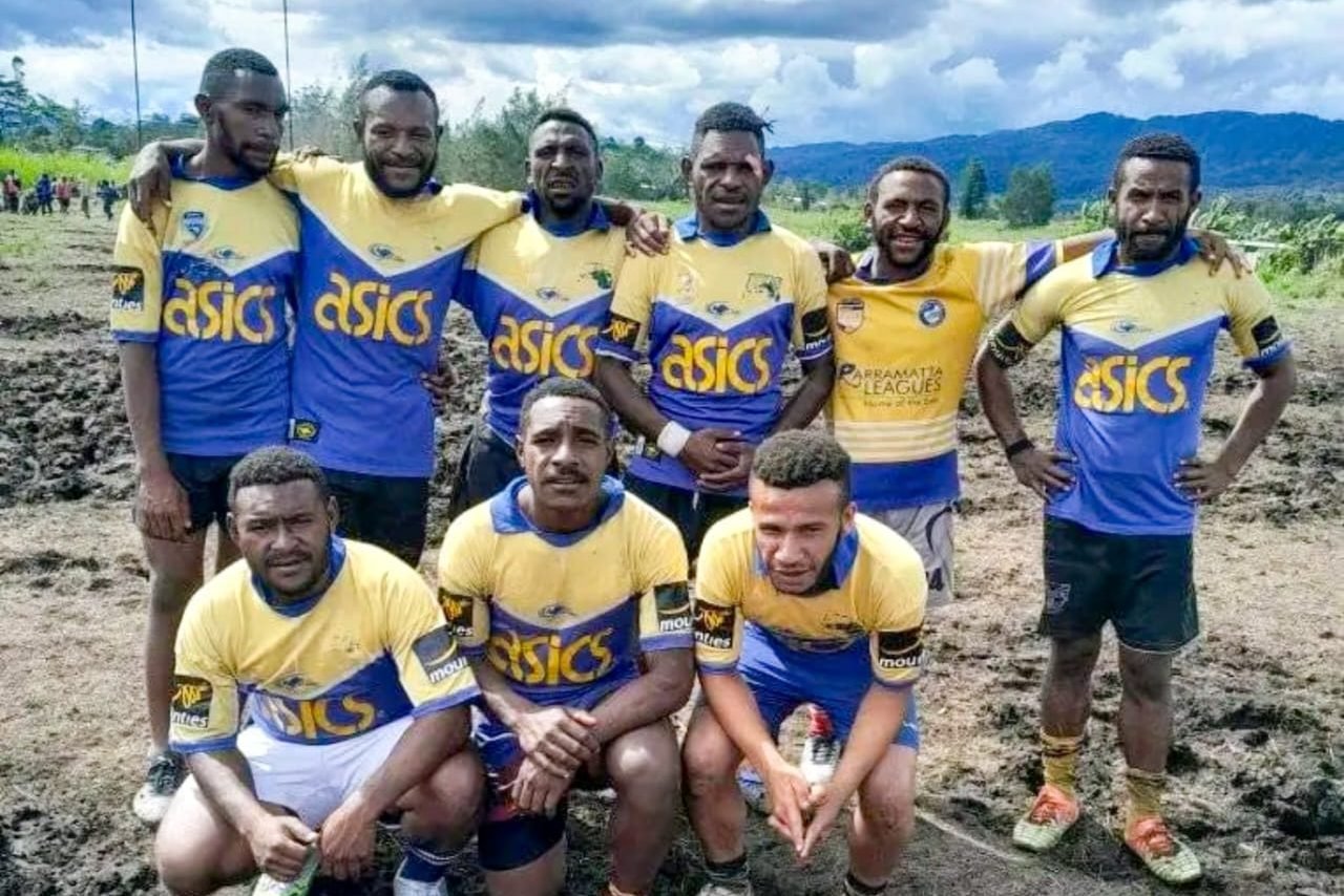 A Local Team in Kagua Rugby League posing for a photo before their match last weekend